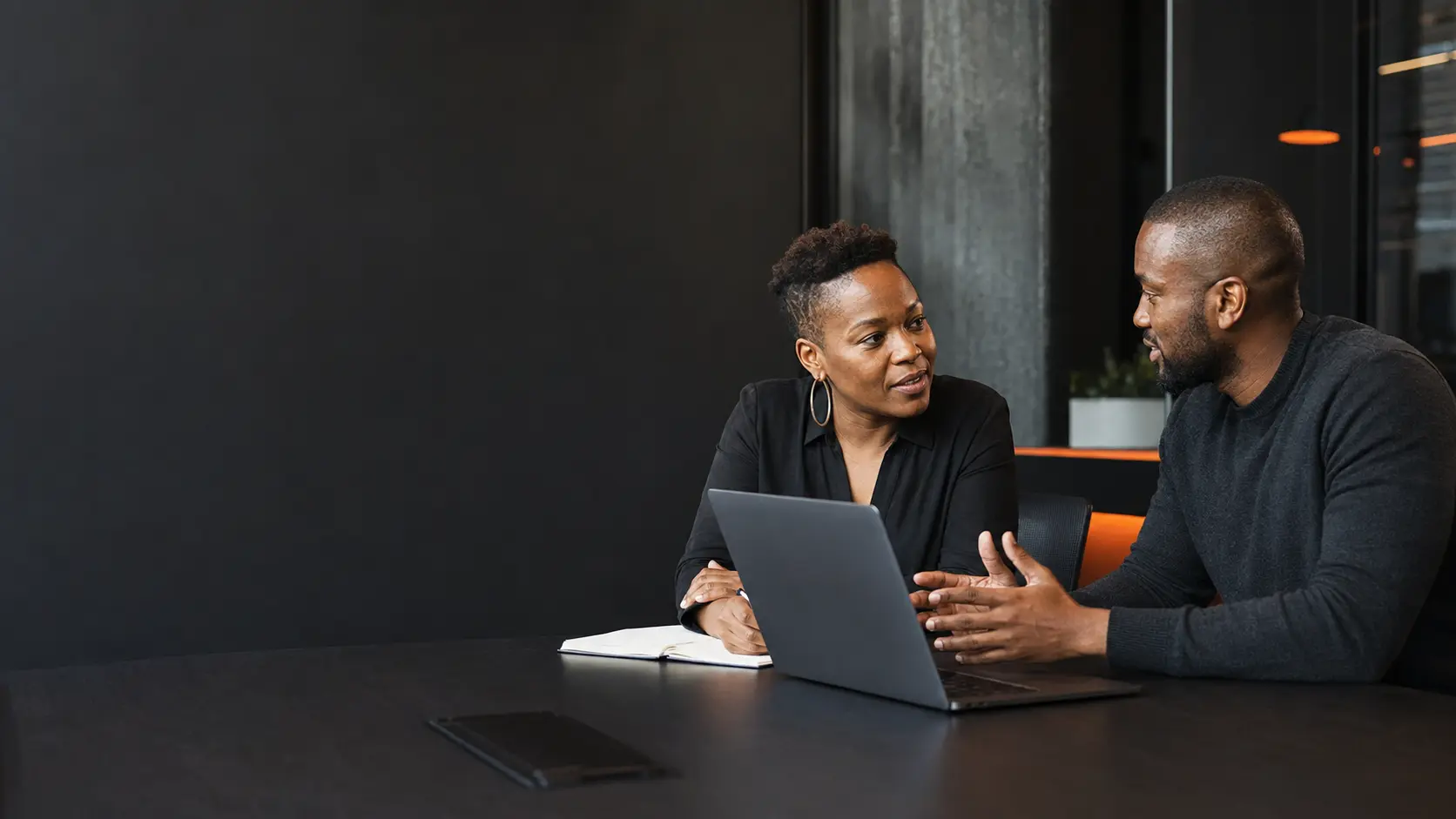 South African digital consultant planning an online project with a business owner